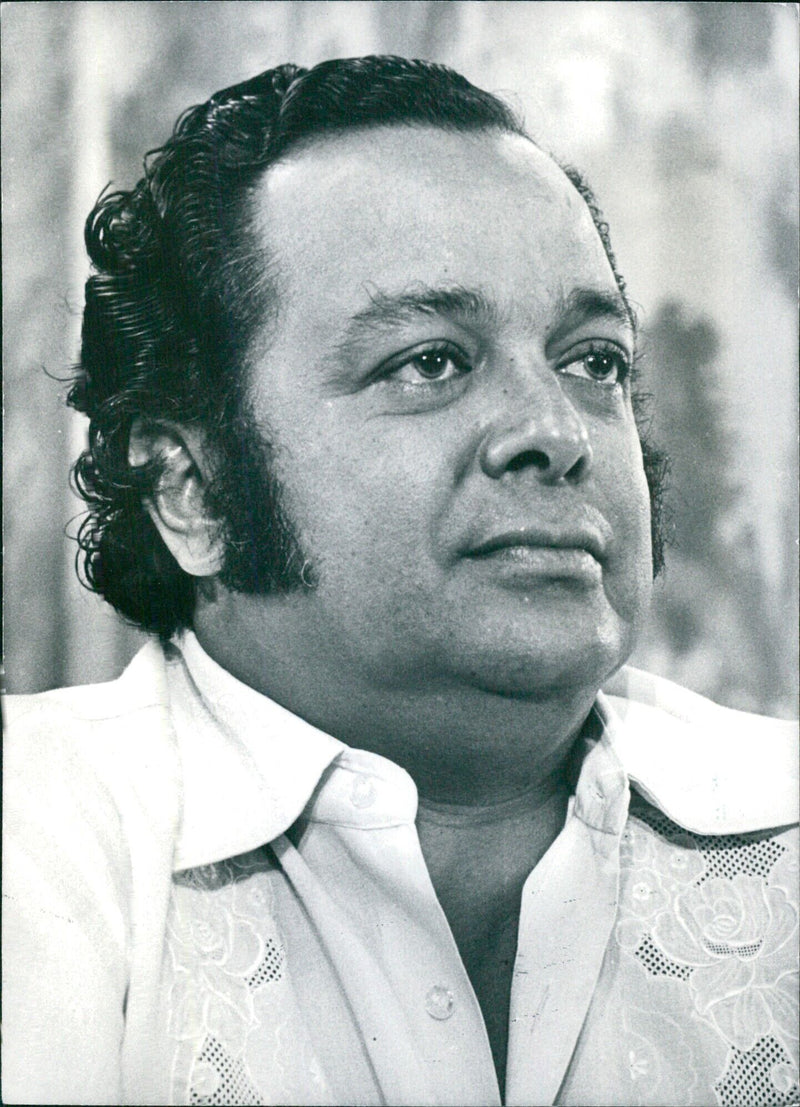 Sir Shridath Ramphal, Minister of Foreign Affairs and Justice of Guyana, poses for a photo in 1973. - Vintage Photograph