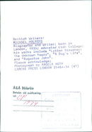 British writer Michael Molroyd poses with his books in London, 1974. - Vintage Photograph