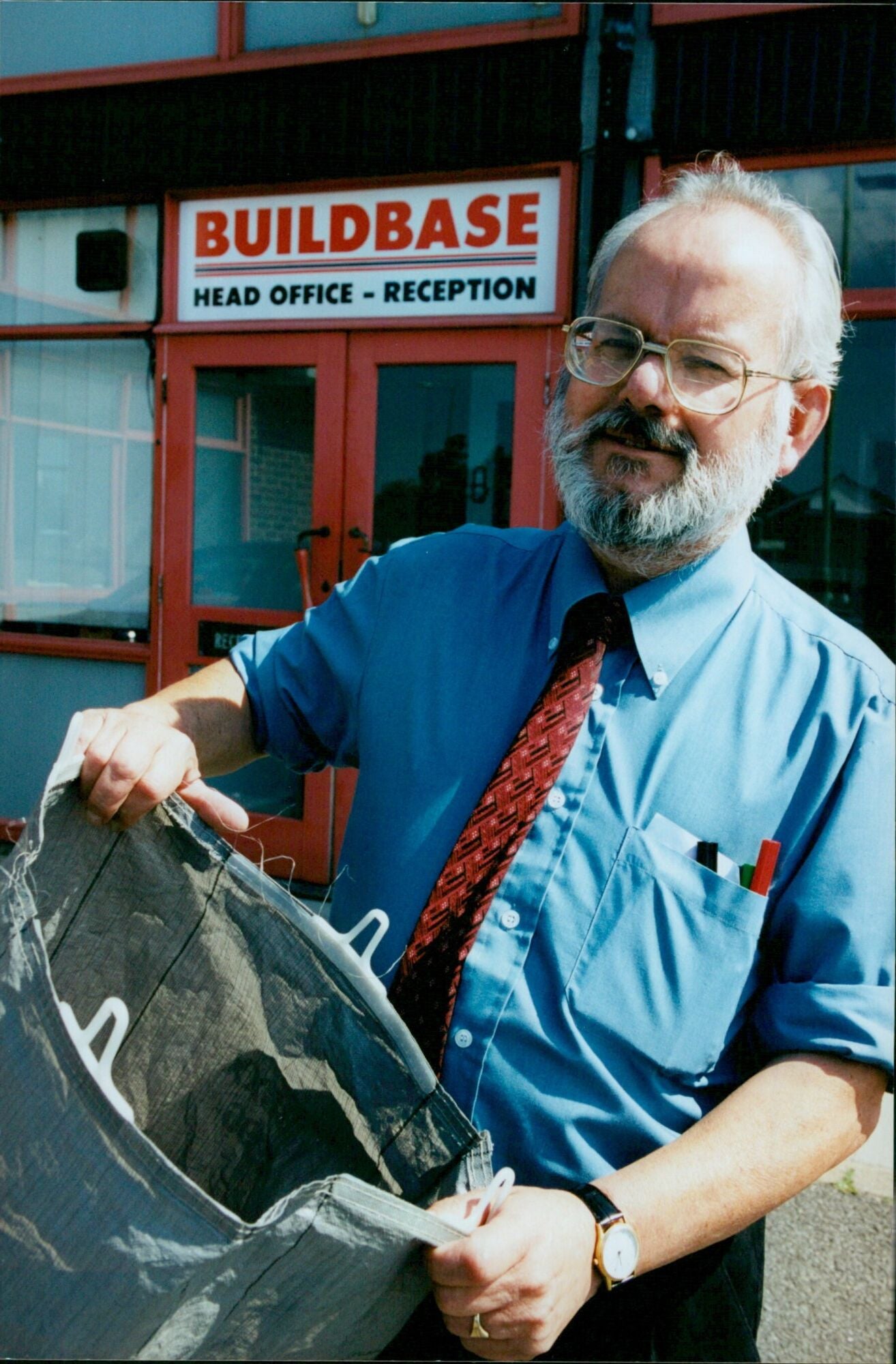 Phil White, a Builder's Merchant from Buildbase Cowley, stands at the