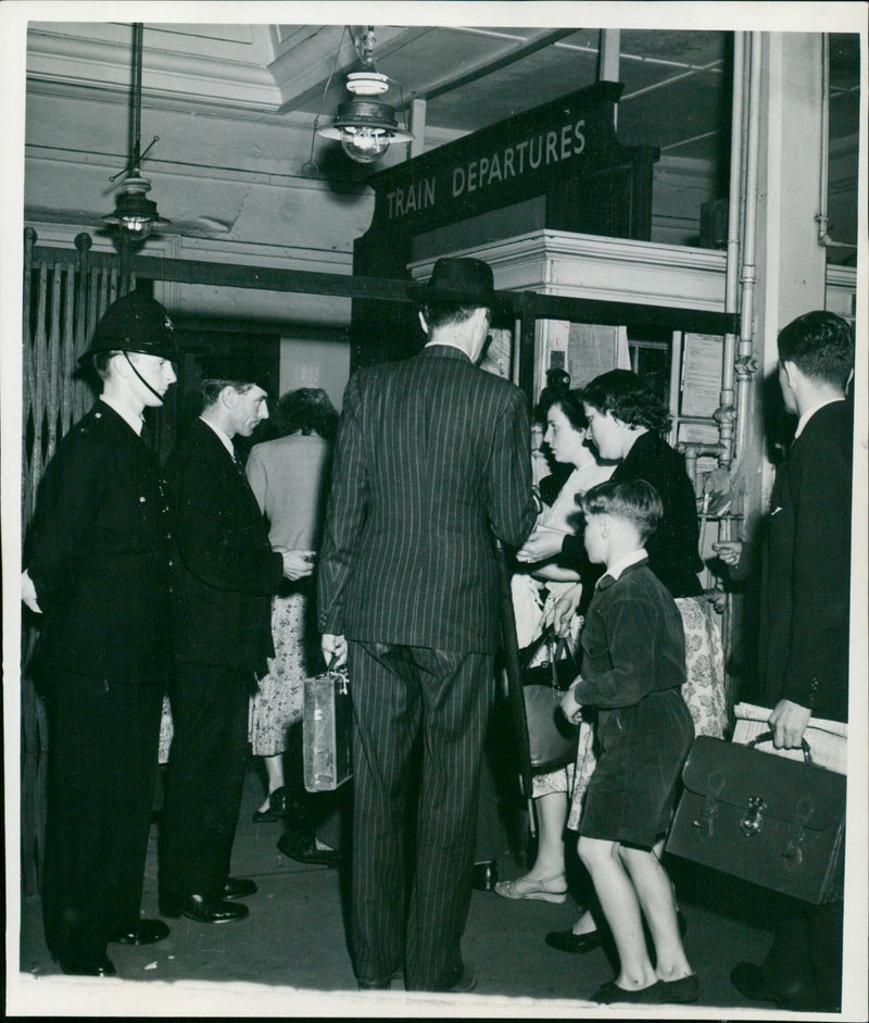 Passengers at Oxford Station await their train departure. - Vintage Photograph