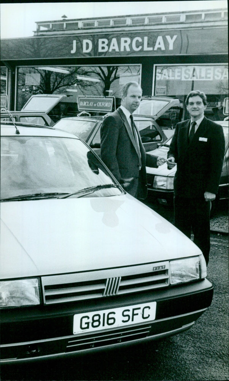 Patric Malony receives the keys to his new Fiat 202 from Tony Bradbury. - Vintage Photograph