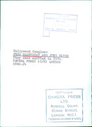 Hollywood couple Fred MacMurray and June Haver pose for a portrait in 1954. - Vintage Photograph