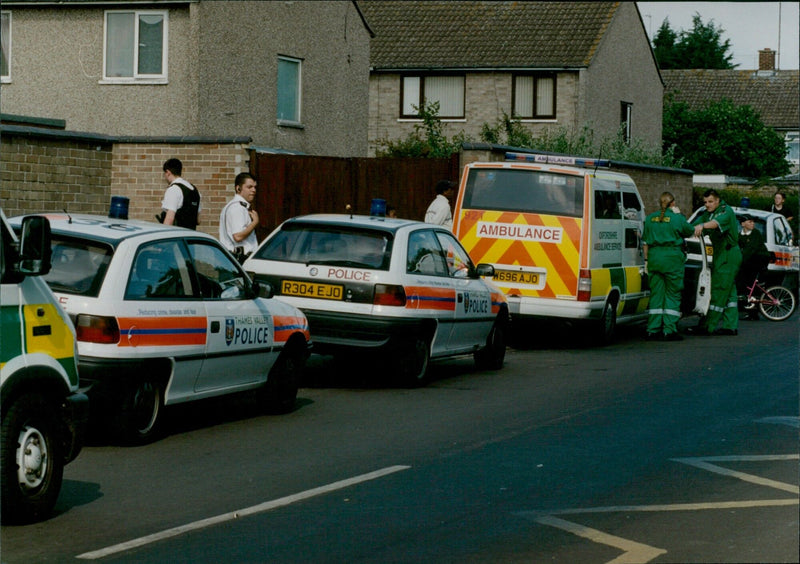Police and ambulance personnel respond to a stabbing in Field Avenue, Blackbirdleys. - Vintage Photograph
