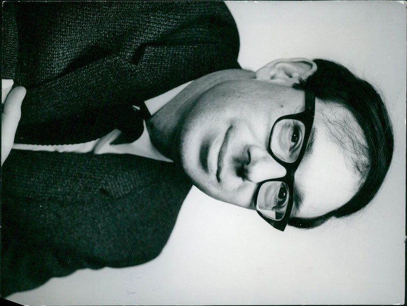 Dan Jacobson, South African writer and Llewellyn Rhys Prize recipient, poses in his London home in May 1970. - Vintage Photograph