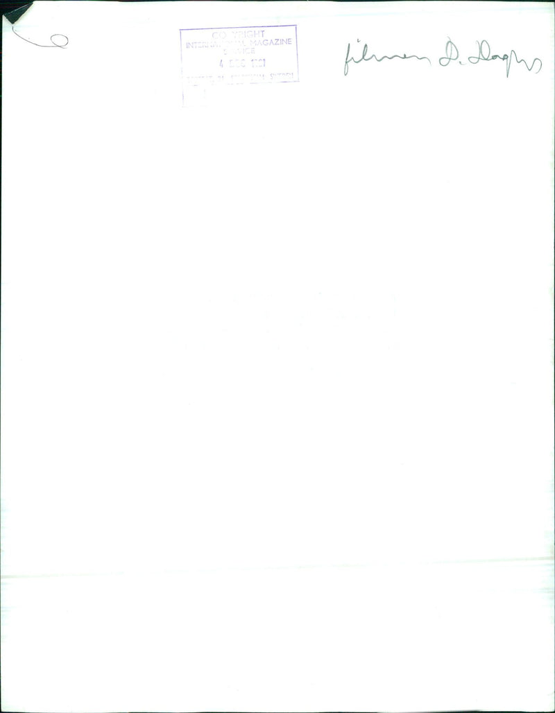 In this picture taken in Sweden, a man is seen holding a movie camera while standing in front of a film set. - Vintage Photograph