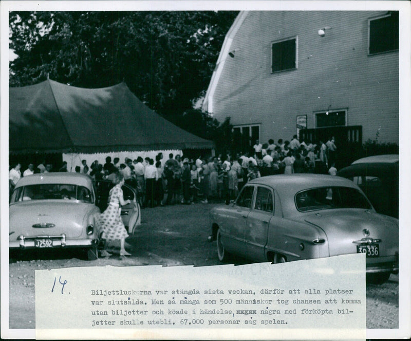 Hundreds of people lined up outside the stadium for the last week of the event, as all tickets were sold out. 67,000 people were in attendance. - Vintage Photograph