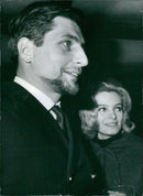 Gunther Sachs von Opel, a young German millionaire widower, is photographed with his friend, Swedish model Birgitta Laaf, on February 12, 1963 in Stockholm, Sweden. - Vintage Photograph