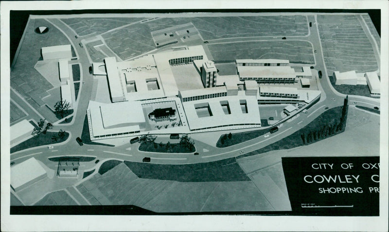 A model of the Cowley Centre designed by Mr. E. G. Chandler, City Architect and Planning Officer, is presented. - Vintage Photograph