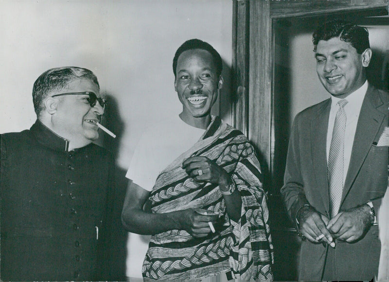 Three leading politicians from Tanganyika, S.T. That, Julius Nyerere, and Al Noor Kassum, pose for a photograph. - Vintage Photograph