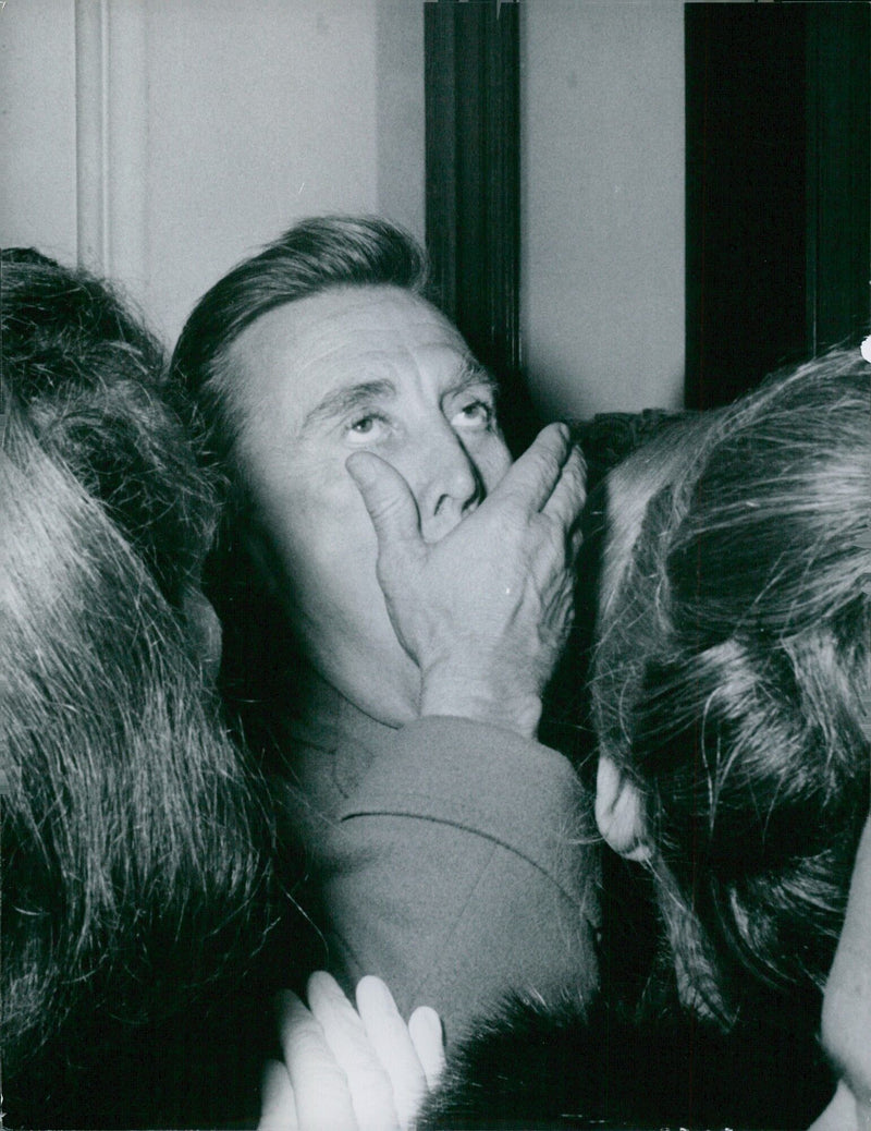 On June 12, 2021, a woman wearing a face mask stands in front of a mural in the city of Stockholm, Sweden. - Vintage Photograph