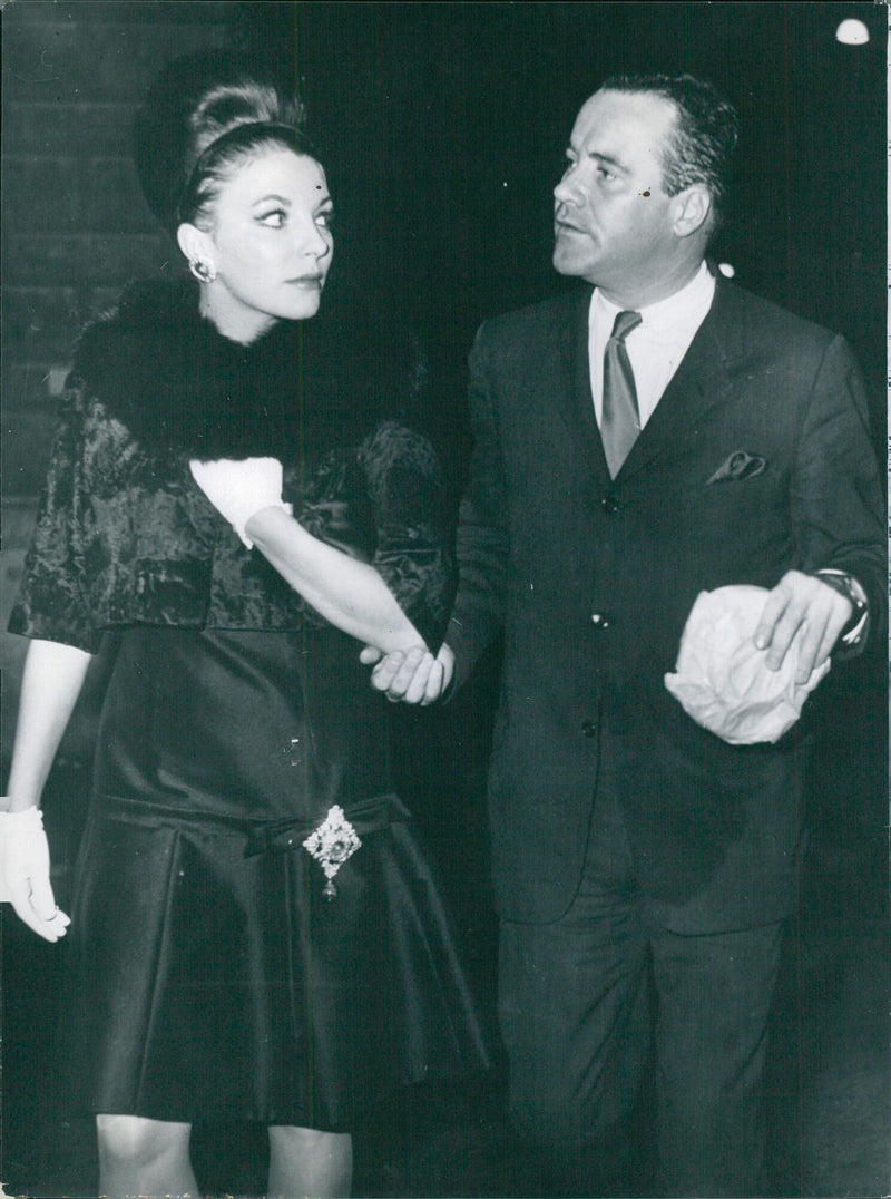 Actors Jack Lemmon and Joan Collins enjoy a night out in Rome on October 18, 1981. - Vintage Photograph