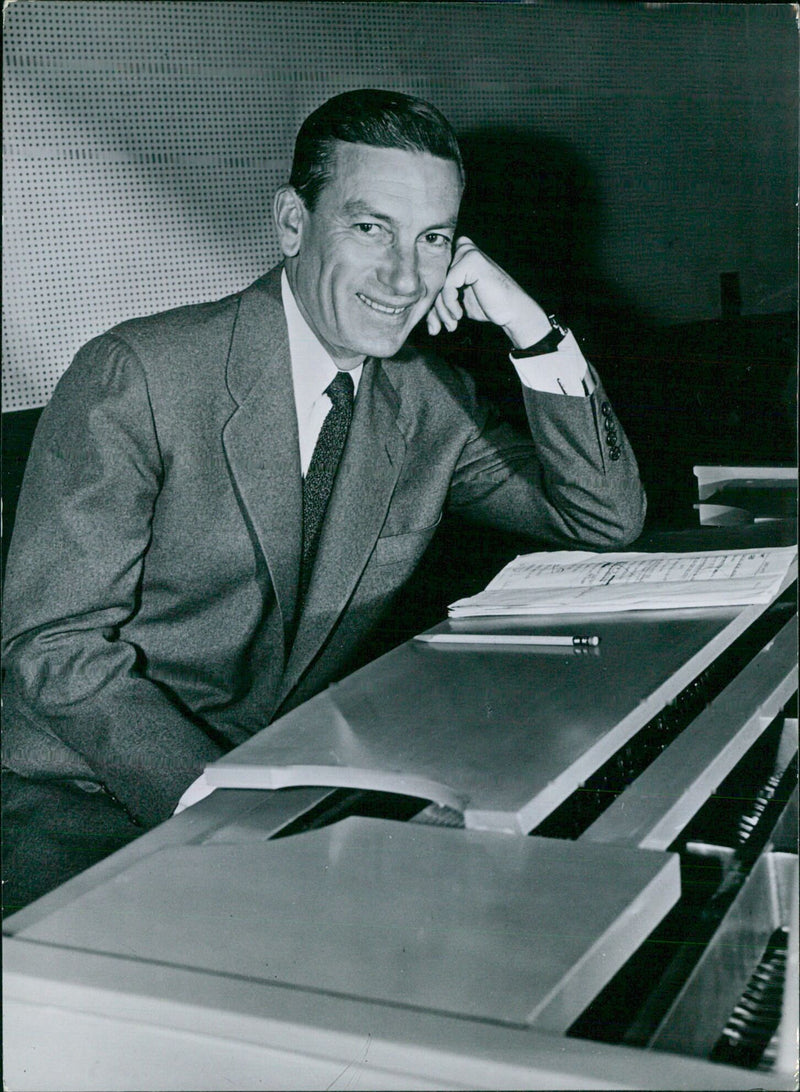 American entertainer Hoagy Carmichael, composer-pianist and film star of the popular song "Stardust", poses for a portrait in London. - Vintage Photograph