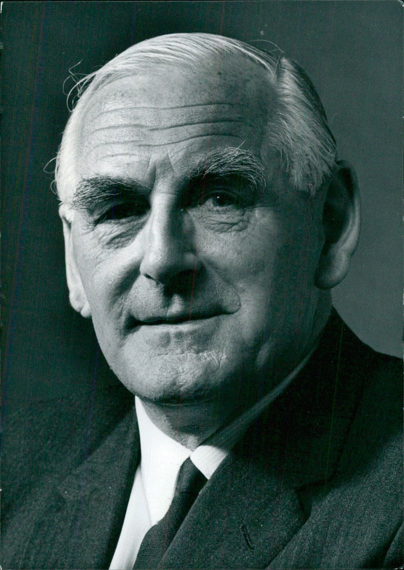 Sir Henry Johnson, Chairman of the British Railways Board, poses for a portrait study taken by Godfrey Argent for the archives of the National Portrait Gallery in London. - Vintage Photograph