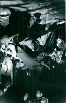 A couple dances to the music at a fashion-themed event in Stockholm, Sweden in 1965. - Vintage Photograph