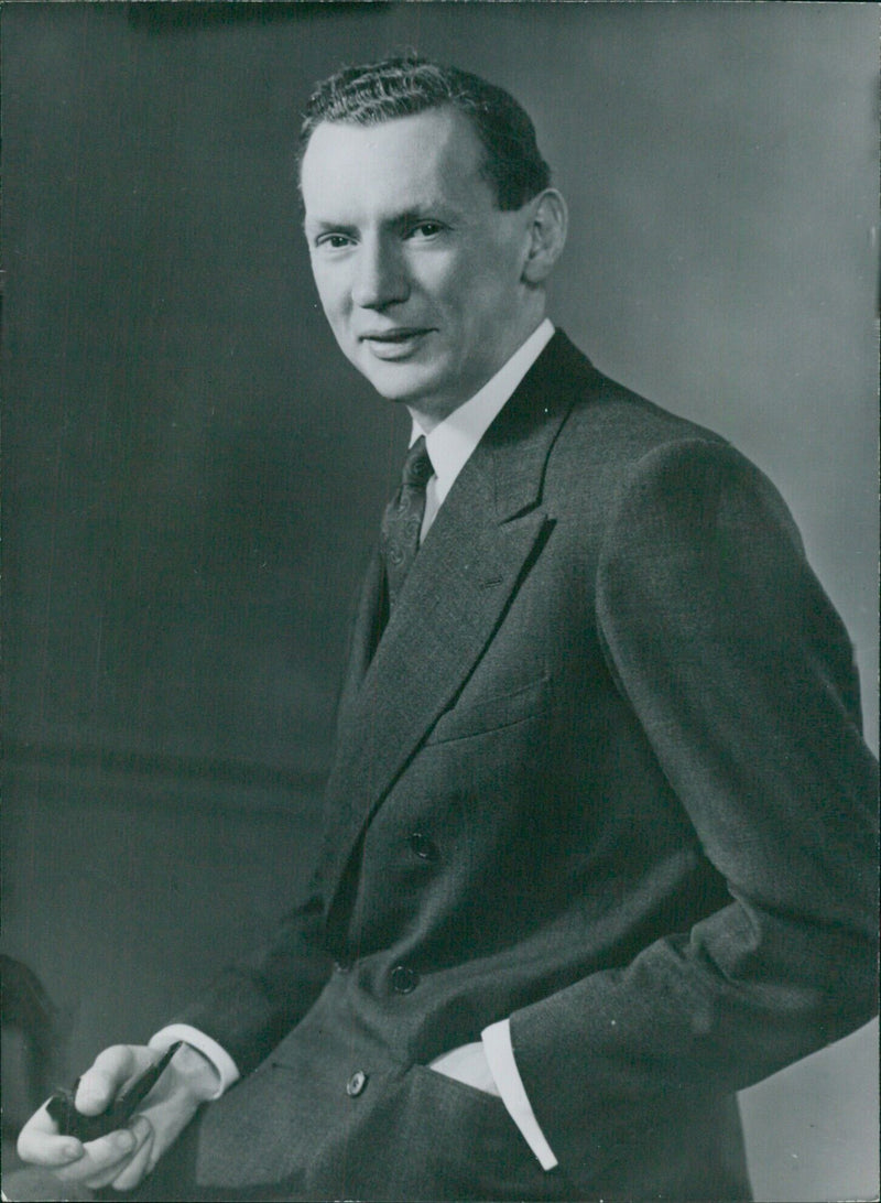 French Foreign Minister Maurice Couve de Murville is pictured during a meeting in Stockholm, Sweden in 1960. - Vintage Photograph