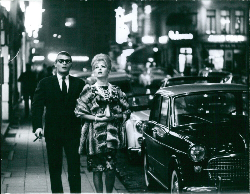 A group of people gathered in Paris to protest against the government's restrictive measures. - Vintage Photograph