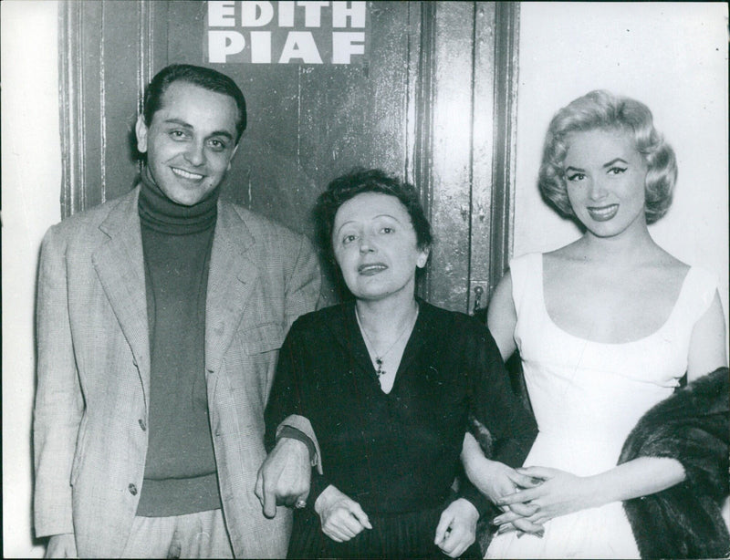 French singer, Edith Piaf, poses backstage at a concert in Stockholm, Sweden on October 3, 1960. - Vintage Photograph