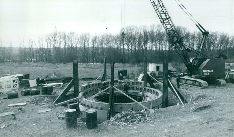 A new trunk sewer is under construction between Littlemore and Christ Church Meadow in Oxford, UK. - Vintage Photograph