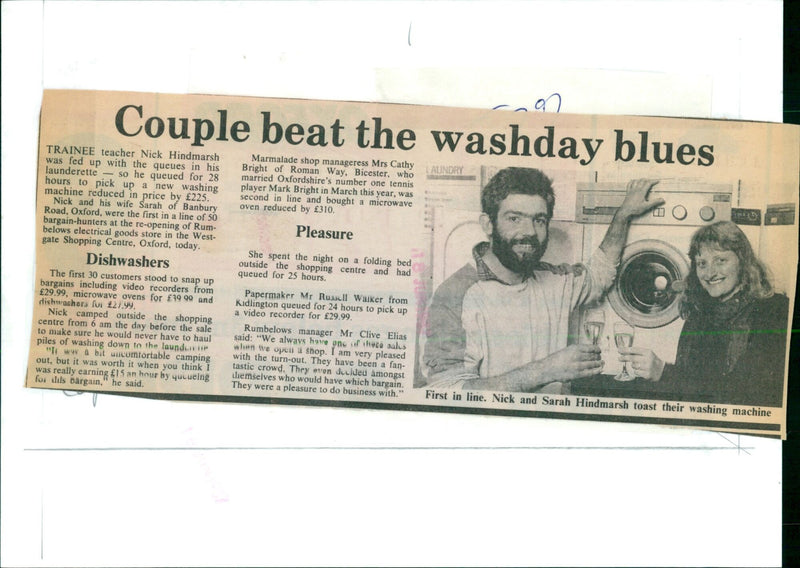 Nick and Sarah Hindmarsh toast their newly purchased washing machine after queuing for 28 hours at Rumbelows. - Vintage Photograph