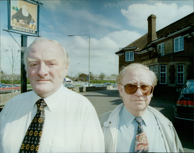 Landlord Thomas Cleary and regular Joe Bradshaw at Morrells pub in Cutteslowe. - Vintage Photograph