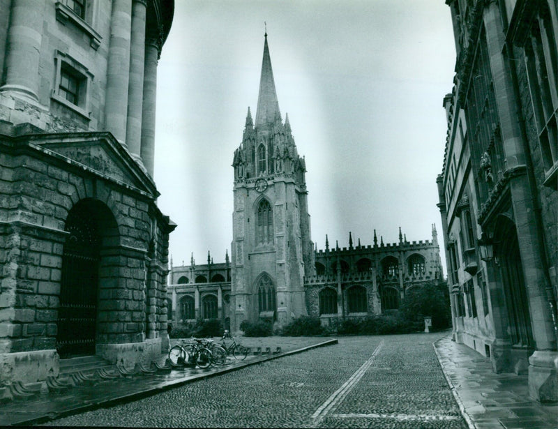 A 101240 Square foot building in Oxford, England, stands tall against the skyline. - Vintage Photograph