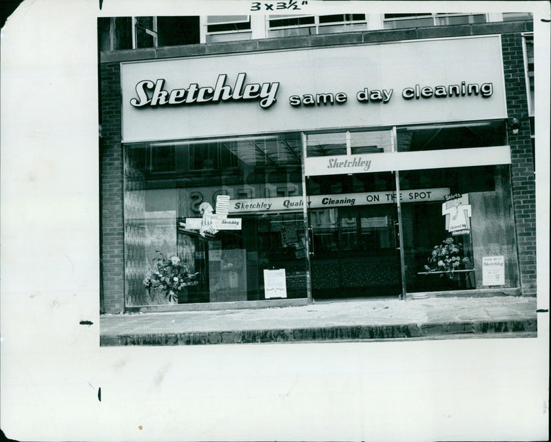 A man wearing a shirt being cleaned by the same-day cleaning service Sketchley. - Vintage Photograph