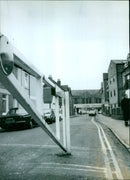 City officials present plans to prohibit parking on Chapel Street, East Avenue, and Mazil Way. - Vintage Photograph