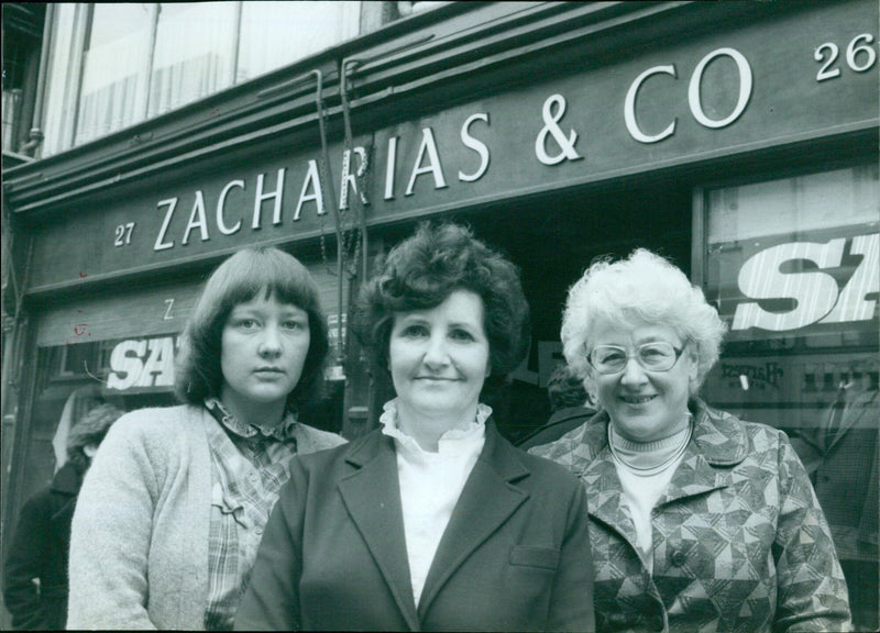 Zacharias & Co employees demonstrate a new product during a photo shoot. - Vintage Photograph