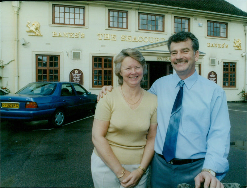 The new landlord of the Seecourt Inn, Geoff Warins, stands behind the bar on his first day. - Vintage Photograph