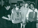 Pupils of Shepherd's Hill School model lifejackets during a fund-raising visit by the Royal National Lifeboat Institute. - Vintage Photograph