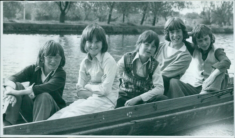 Five young coxes from the City of Oxford boat club stand with their boats. - Vintage Photograph