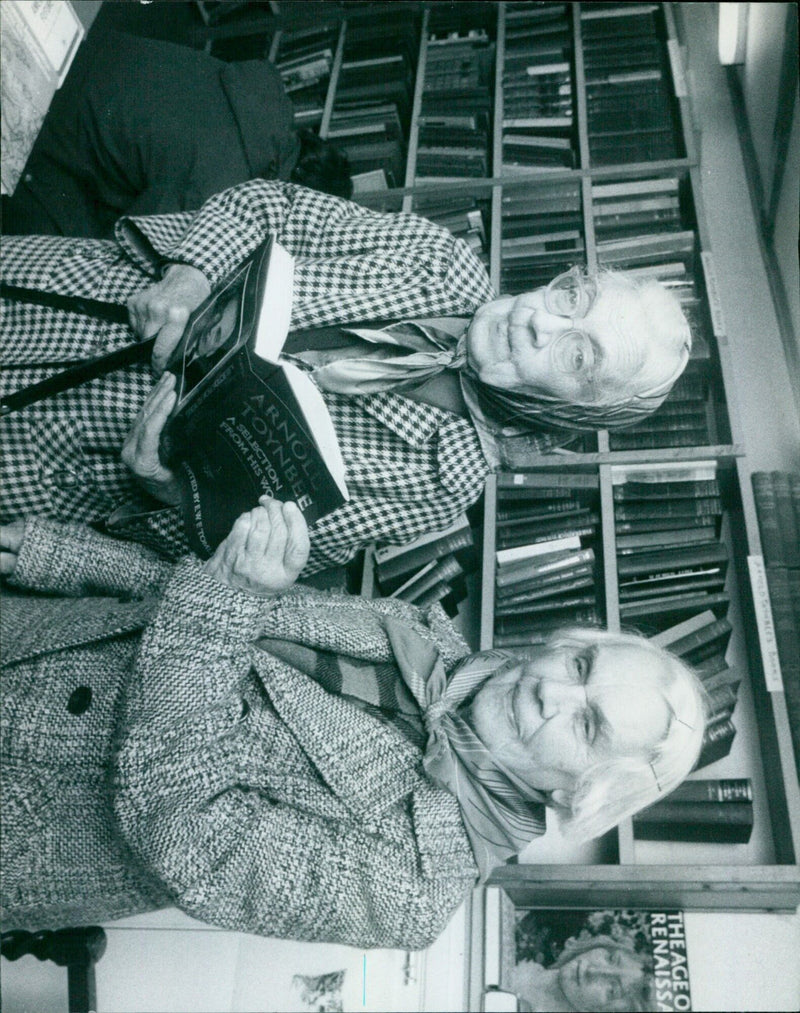 A selection of works by the Age of Renaissance author, Arnold Toynbee, on display at the Mon Ciné Theatre. - Vintage Photograph