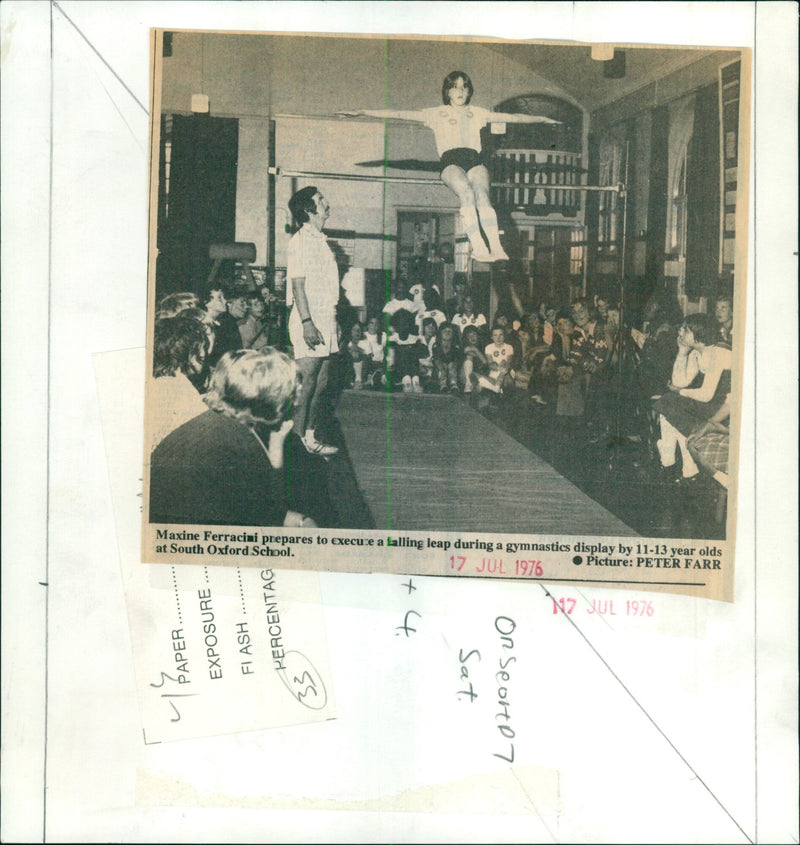 Maxine Ferracini performs a tumbling leap during a gymnastics display. - Vintage Photograph