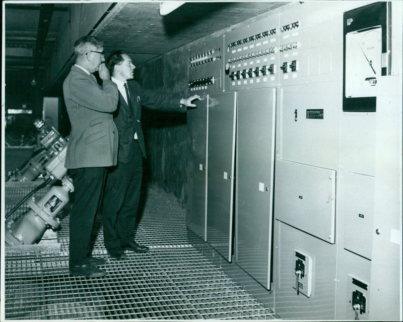 Mr. A. E. O. Salmon and his team of volunteers inspect a sewage treatment plant in Oxford. - Vintage Photograph