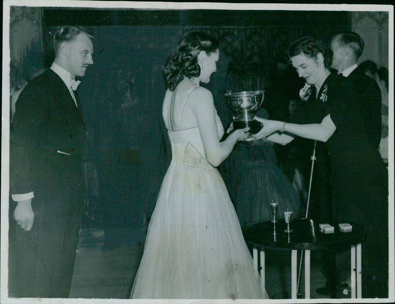 Miss Marie Lecamp presents a trophy to the Oxfordshire Amateur Dancers, Mr. and Mrs. Butterworth. - Vintage Photograph