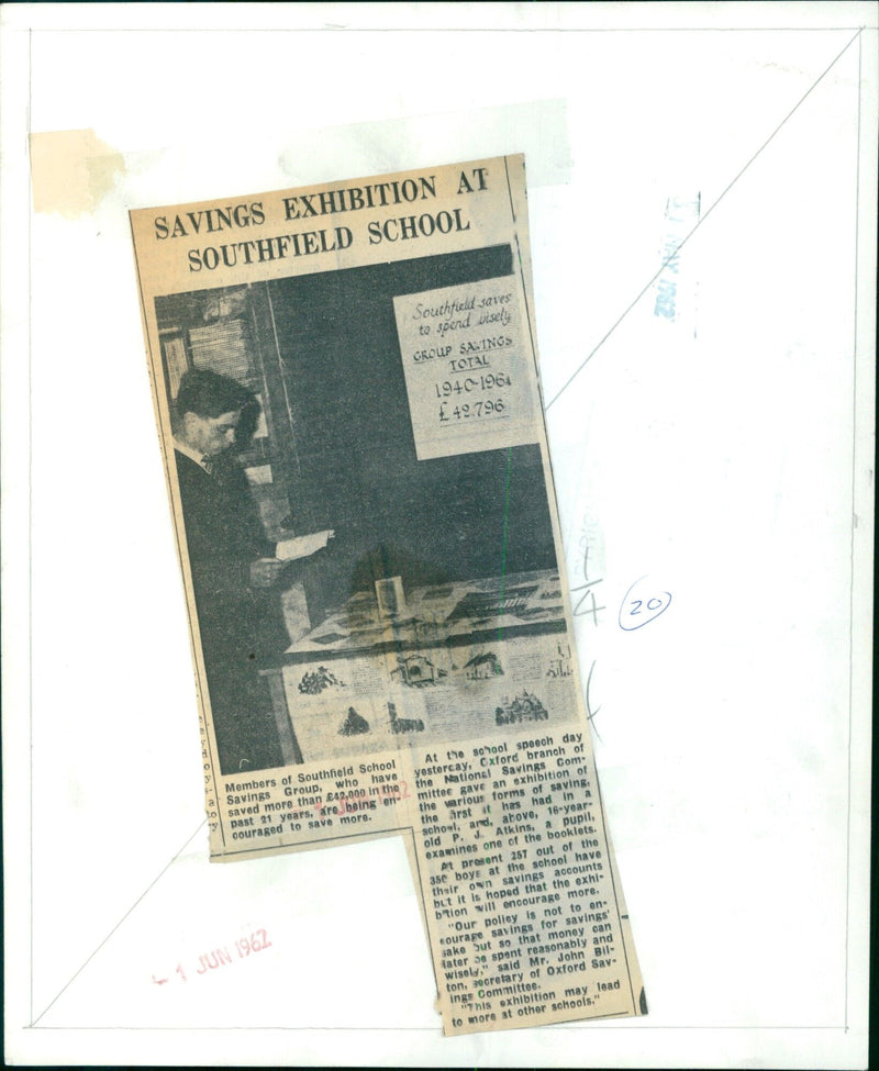 Members of Southfield School Group examine the various forms of saving on display at their Savings Exhibition. - Vintage Photograph