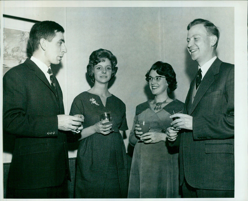 Members of the 17th S. Helland, MUS. P.A.T. Youdley and DVD.C.M. Youdley pose at the O.U. Ai San Cocktail Party on 11 December 1961. - Vintage Photograph