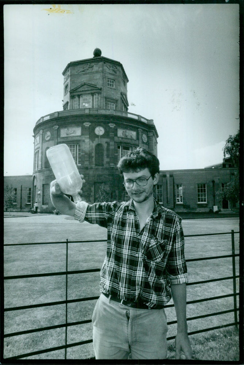 Peter Venters taking a meteorological reading at the University of Oxford's Ebi Green College. - Vintage Photograph