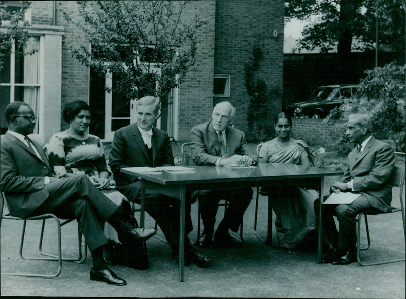 Lord Chandos, president of the Queen Elizabeth House, pictured with the High Commissioner of Ghana, Mr. K. C. Turpin, and the High Commissioner of Ceylon. - Vintage Photograph