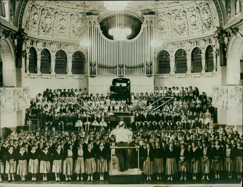 Students rehearsing music in school on May 17, 1958. - Vintage Photograph