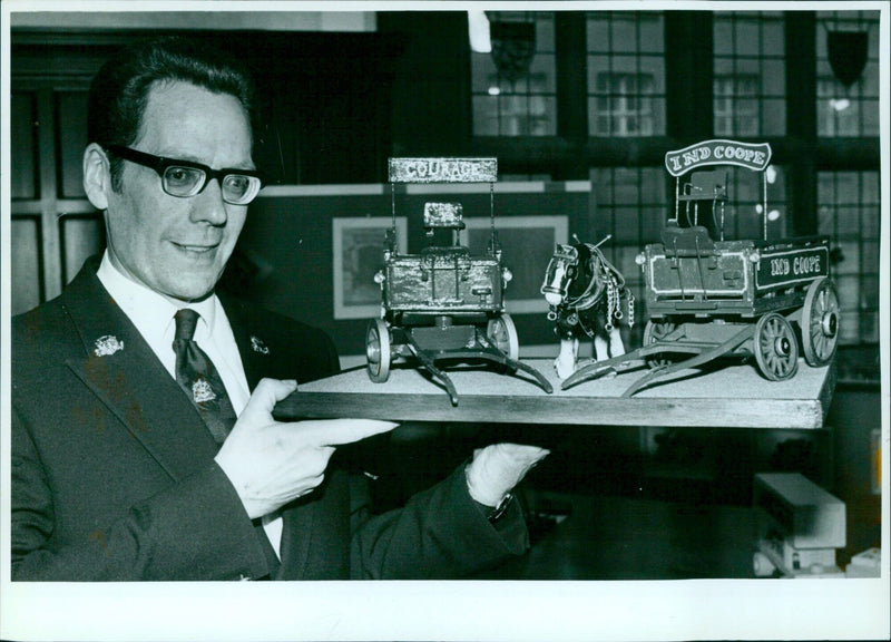 Assistant Town Hall Keeper Henry Ollenbuttel with his models of brewery drays. - Vintage Photograph