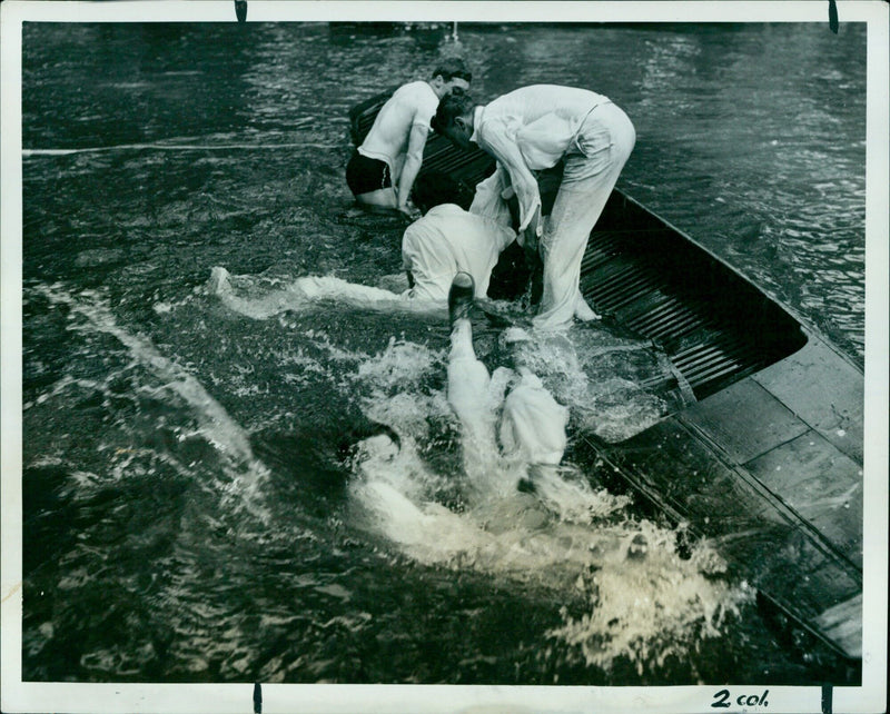 The Oxford team celebrates their victory in a rowing race. - Vintage Photograph