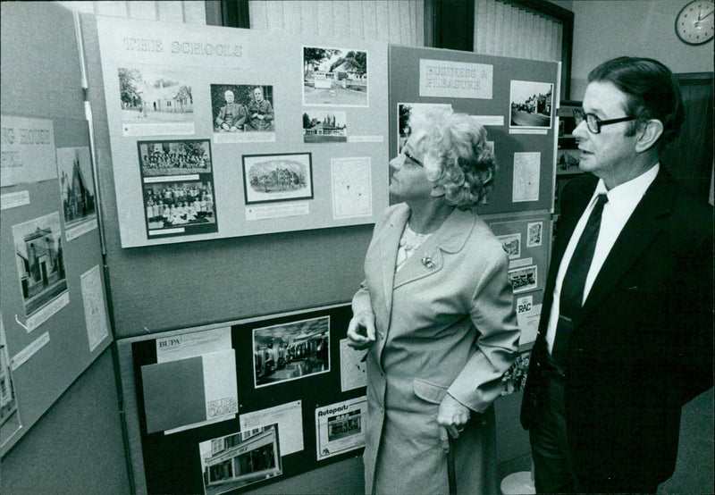 George and Mary Salisbury taking in the Midland Bank's exhibition of photographs depicting Summertown's history. - Vintage Photograph