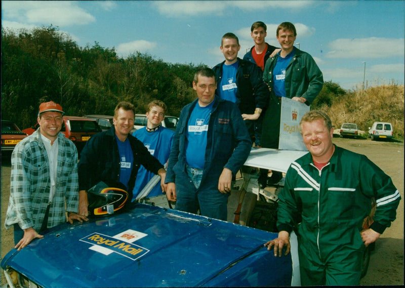 Members of the Oxford Area Royal Mail Team take part in a banger racing event at Standlake, Oxfordshire. - Vintage Photograph