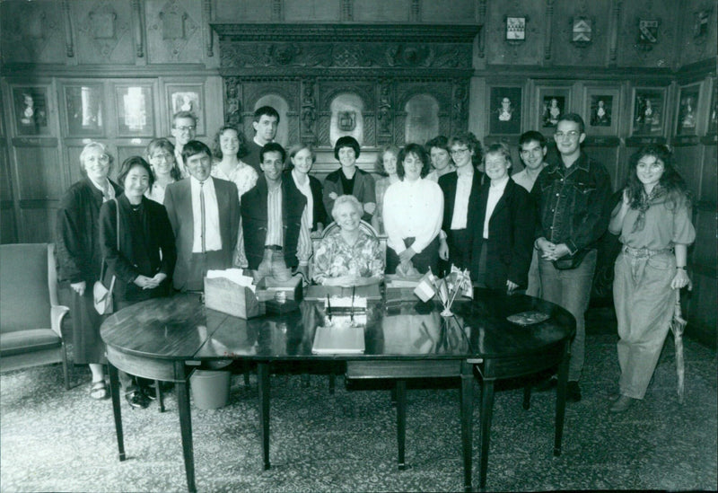 Students from Bonn, Germany, meet with Deputy Mayor Lalo Mayot of Queenip Comfoli in Bonn. - Vintage Photograph