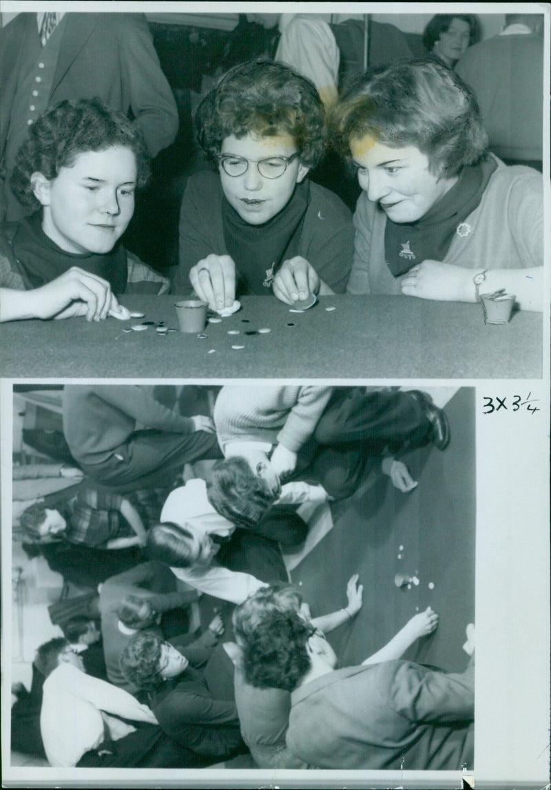 Three members of Oxford University's Tiddlywinks team in action. - Vintage Photograph