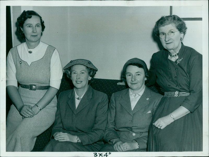 Townswomen gather in a field to celebrate their achievements. - Vintage Photograph