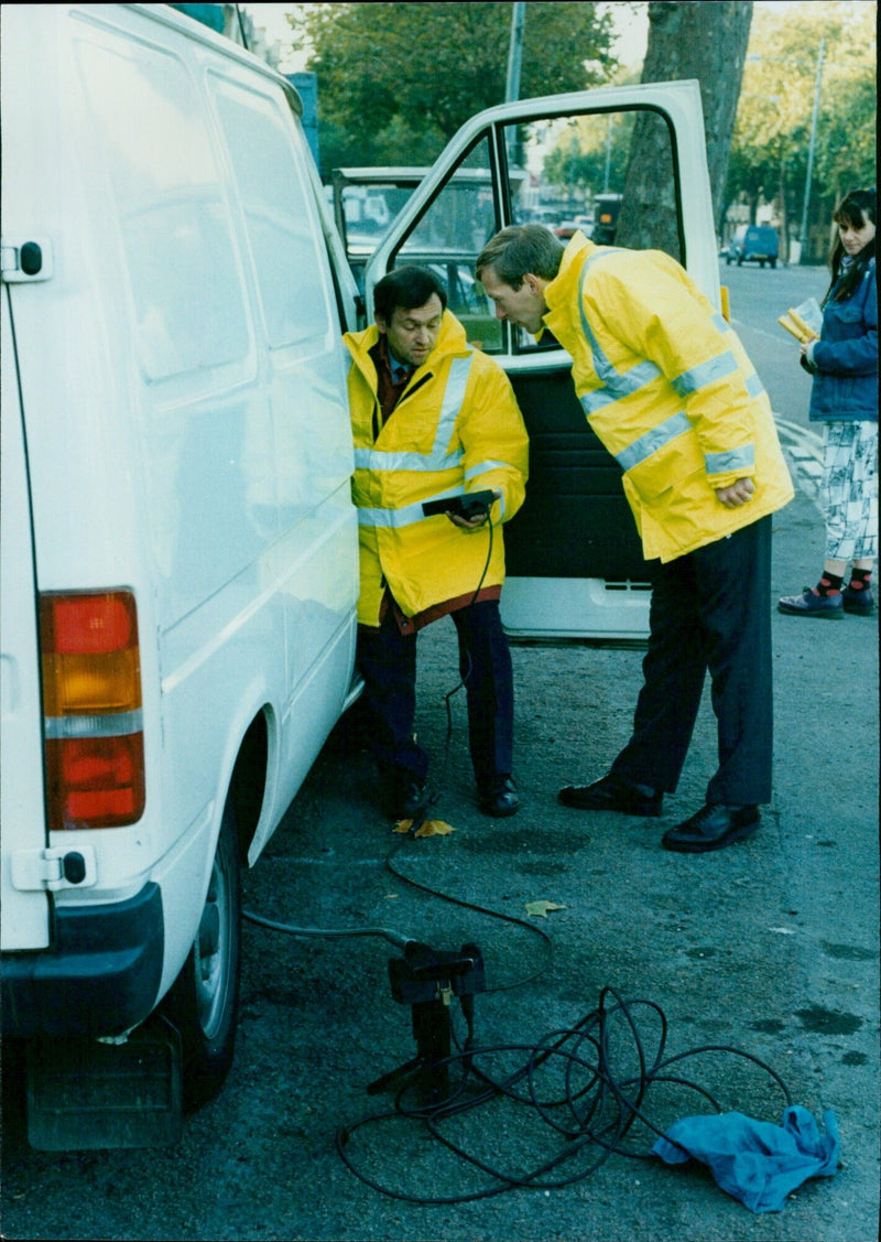 Vehicle testers conducting exhaust emissions testing in St Giles, Oxford. - Vintage Photograph