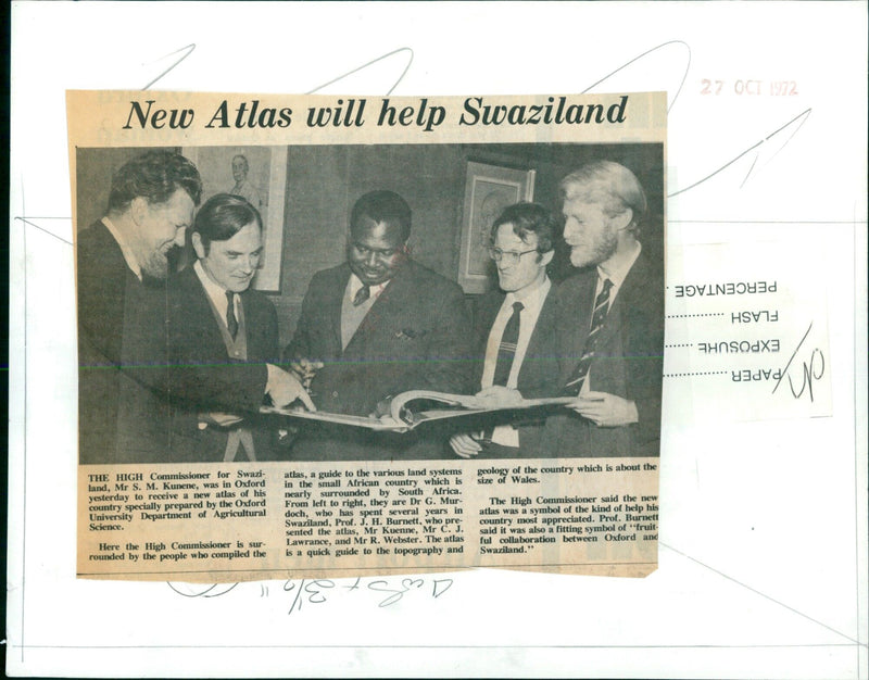 The High Commissioner of Swaziland, Mr S. M. Kunene, receives a new atlas of his country from the Oxford University Department of Agricultural Science. - Vintage Photograph