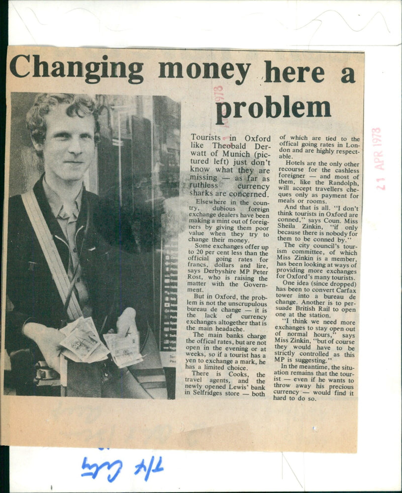 In Oxford, England, tourists like Theobald Derwatt of Munich have limited options when it comes to exchanging foreign currency. - Vintage Photograph